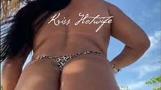 The married woman shows off her bikini stuffed in her ass at the beach