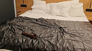 Latexi69 Sucks Dildo and Inserts It Anally with Ease