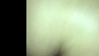 A petite Latina with big booty bends over for doggystyle fucking by a huge cock