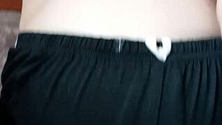 this pregnant milf spits on her big tits and nipples for fun