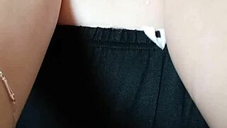 this pregnant milf spits on her big tits and nipples for fun