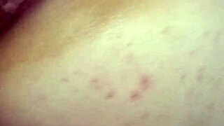 Watch this tattooed latina scream as she takes a facial cumshot on her big tits in thong.