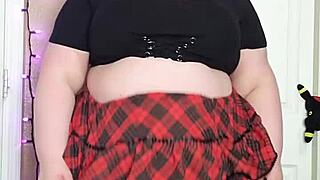 The hairy bbw casually walks around without wearing any panties under her miniskirt