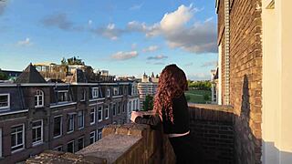 Skinny teen 18+ in dress and skirt bent over for doggystyle fucking on the balcony outdoors