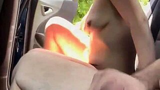 busty hooker rides cock reverse cowgirl in car.