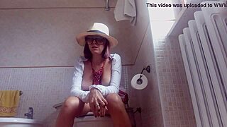 Brunette with Big Tits Caught on Hidden Toilet Cam