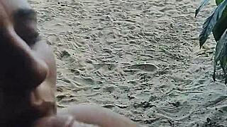 Exhibitionist couple fucks on public beach, stranger joins to cum