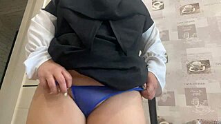 Syrian milf teases pussy through panties in solo play