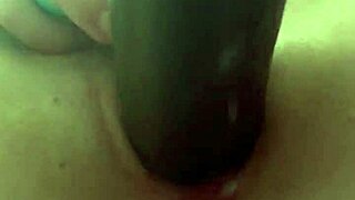 katie bugg passionately fucks herself with a black dick, ripping clothes and masturbating her wet pussy