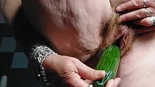 Grandma Fucks Hairy Pussy With Cucumber