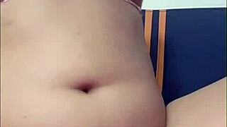 Hot girl dances and strokes her pussy in homemade clip