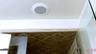 Brunette Model With Long Hair Takes Shower.