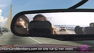 topless brunette flashing big tits in convertible on skyway bridge.