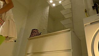 hot brunette college girl in mini tennis skirt and over knee socks shows panties in bathroom, then no panties