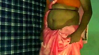 A shemale performs a hot mujra dance in a saree
