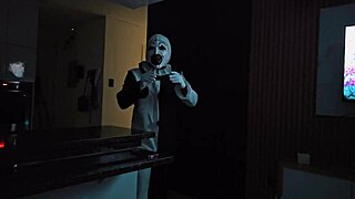 Terrifier bangs Natalia Alvarado under Halloween's spooky moonlight.