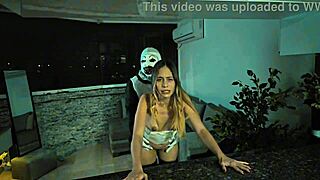 Terrifier bangs Natalia Alvarado under Halloween's spooky moonlight.