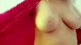 mature blonde woman in lingerie shows huge tits