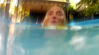 hey, melissa the mermaid with her tattoo and brown eyes is chilling by the pool today