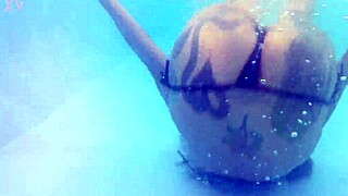 hey, melissa the mermaid with her tattoo and brown eyes is chilling by the pool today