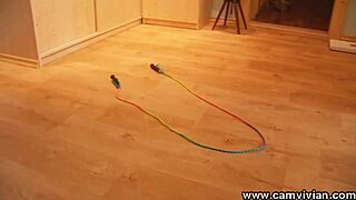 Topless babe skipping rope in stockings.