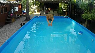 hey, melissa the mermaid with her tattoo and brown eyes is chilling by the pool today