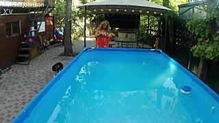 hey, melissa the mermaid with her tattoo and brown eyes is chilling by the pool today