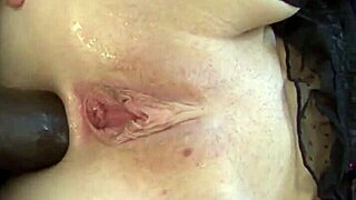 the redhead whore cheats, moaning as she's banged in anal with big black cock