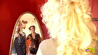 two vintage lesbians kiss sensually