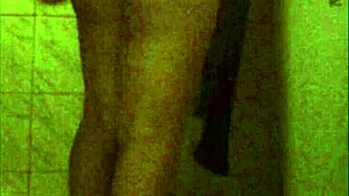 this ebony babe has a perfect ass in the spy shower