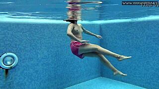 Lady Dee, cute shy Czech teen, swims and smokes by the pool