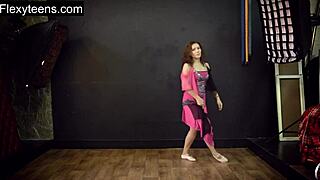 Teen hot flexible model performs acrobatic yoga and stretching poses.