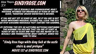 Watch Sindy Rose take that huge white dong up her ass on the castle stairs with prolapse!