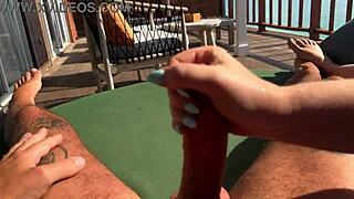 Hot Babe Gives Fast Sloppy Handjob on Terrace Over Ocean with Huge Tits Exposed