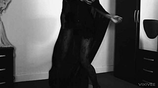 a horny ebony witch in fishnets teases and fucks herself with a cane using buttplug for double penetration on halloween