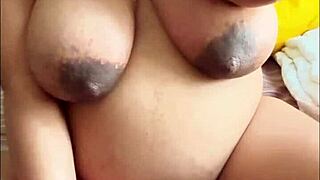 Pregnant Arab babe indulges in solo play with her big boobs and hairy pussy, getting all steamy 😏