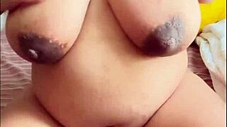 Pregnant Arab babe indulges in solo play with her big boobs and hairy pussy, getting all steamy 😏