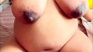 Pregnant Arab babe indulges in solo play with her big boobs and hairy pussy, getting all steamy 😏