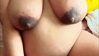 Pregnant Arab babe indulges in solo play with her big boobs and hairy pussy, getting all steamy 😏