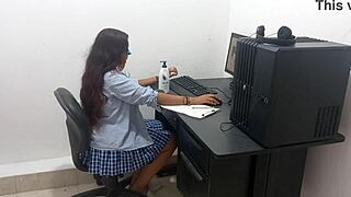 Sexy 18 years old student with big natural tits studies computer classes scantily clad