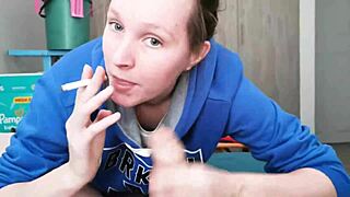 brunette in hoodie sucking cock on bed with cute petite 18+ style