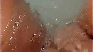 Pretty woman masturbates in hot tub leading to bright loud cumshot watch fully!