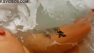 Pretty woman masturbates in hot tub leading to bright loud cumshot watch fully!