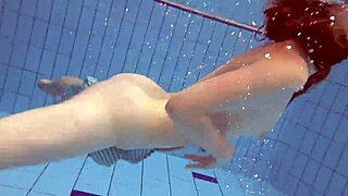 Sexy russian teen 18+ libuse shows petite 18+ small tits in underwater pool scene with blonde babe friend