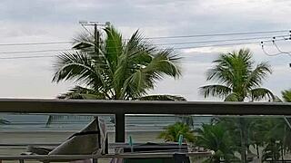 Hey, check out this fun moment showing off the skirt on the balcony in a casual exhibitionist way.