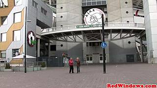 Inked goth prostitute in boots spoils amsterdam tourist with blowjob and shaved pussy.