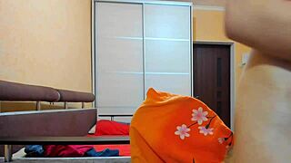 Hey, watch this oiled brunette with big natural tits and big pussy lips masturbating slowly while stripping panties and bra