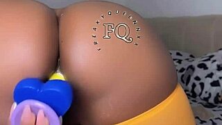 Ebony girl with big breasts masturbates using rose toy and dildo!