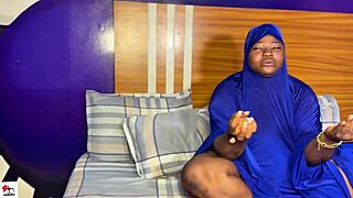 Two ebony girls kiss and fist each other's asses