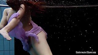 aneta shows off big tits in purple dress during pool time fun